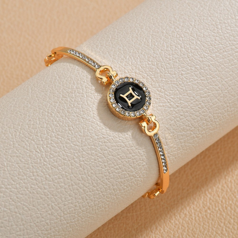 Wholesale Drip Oil 12 Constellation Gold Rhinestone Alloy Bracelet